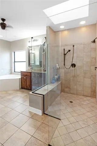 a bathroom with a sink and shower