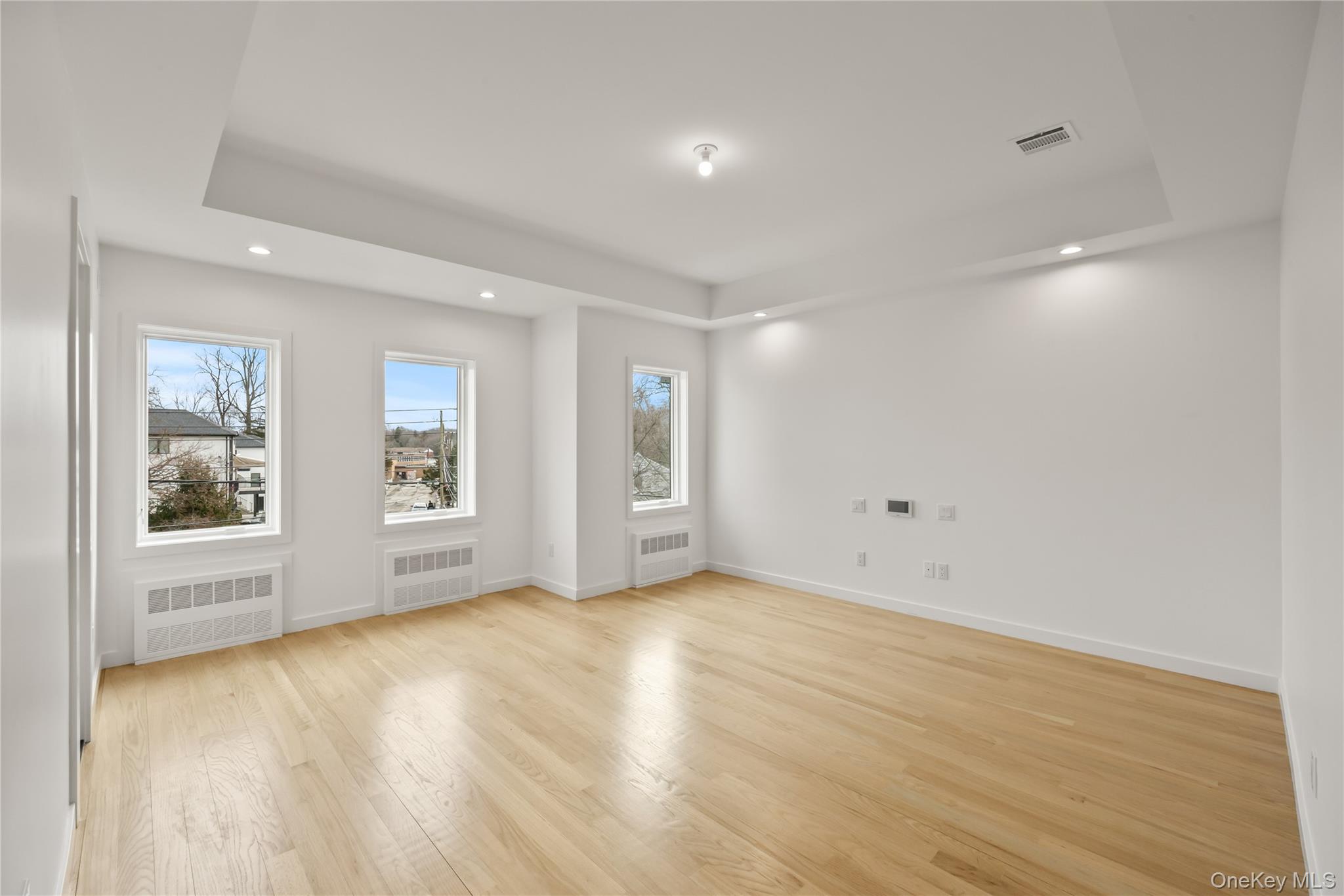 23 Singer Avenue, Unit 211 Spring Valley, NY 10977 - Photo 25 of 45 a view of an empty room with a window