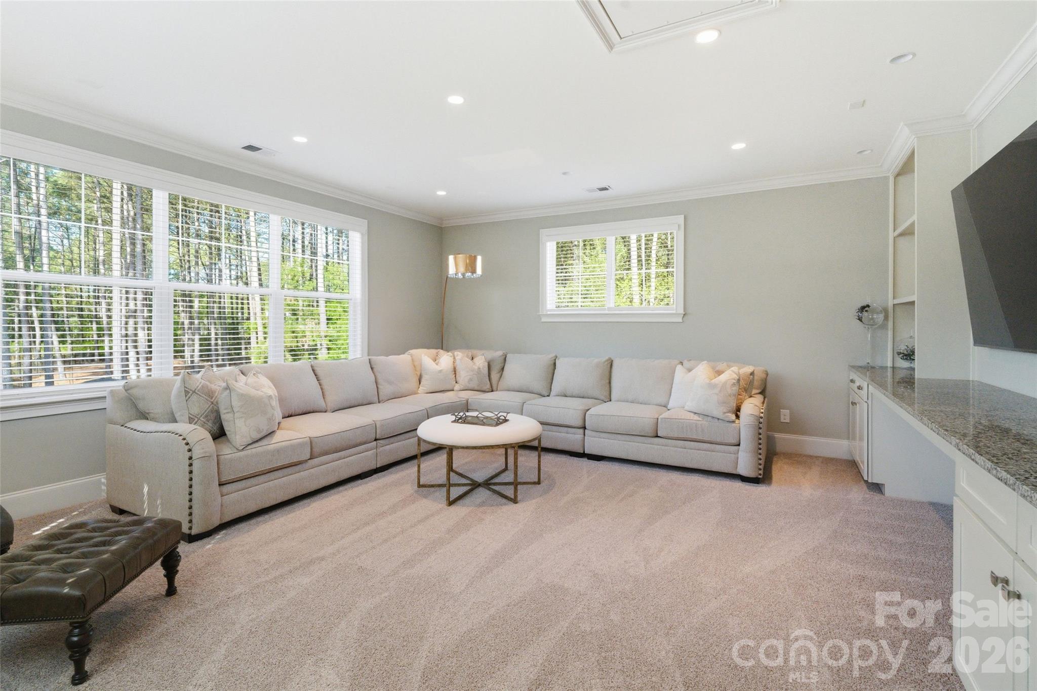 3097 Sherman Drive Lancaster, SC 29720 - Photo 20 of 48 a living room with furniture and a flat screen tv