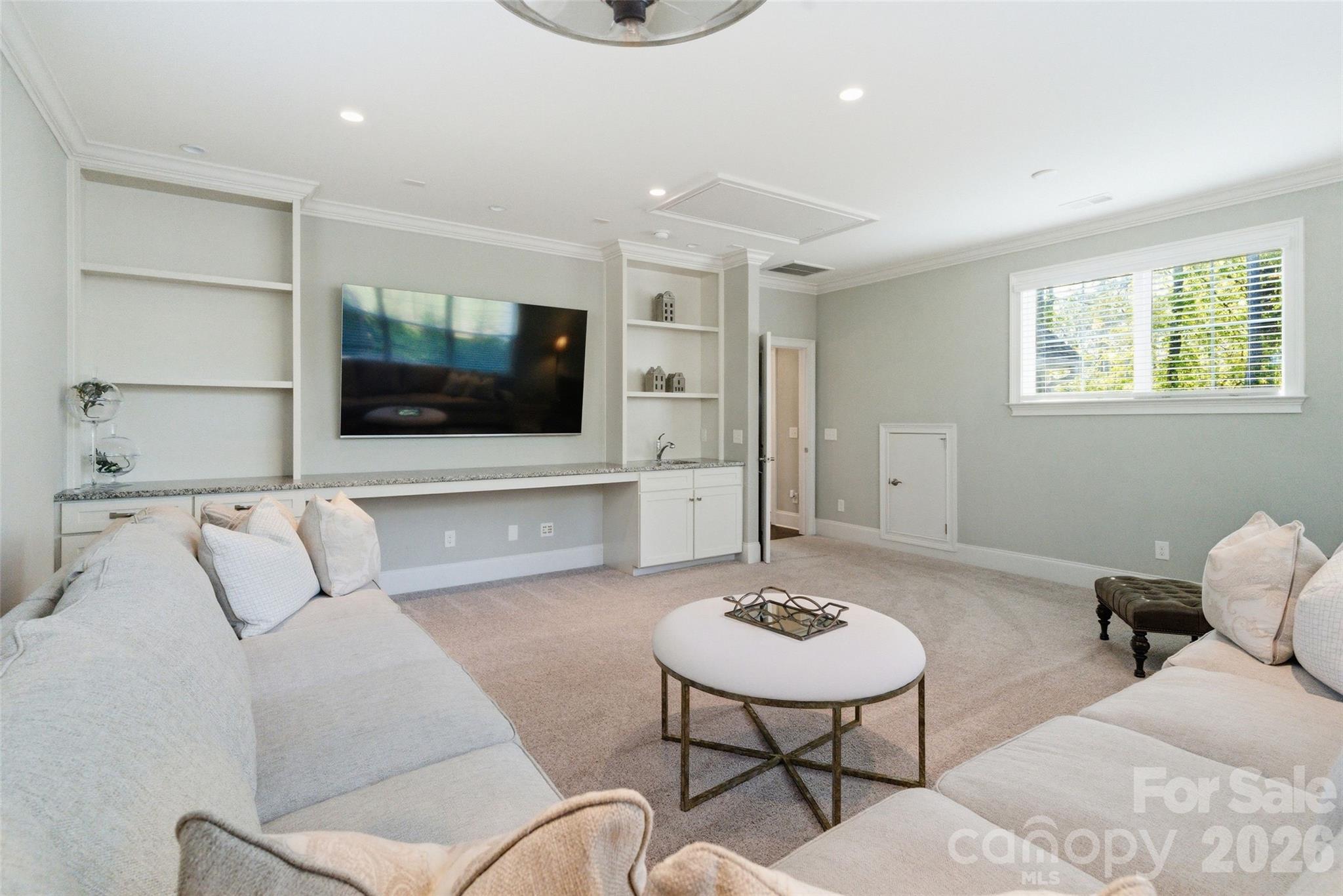 3097 Sherman Drive Lancaster, SC 29720 - Photo 21 of 48 a living room with furniture and a flat screen tv