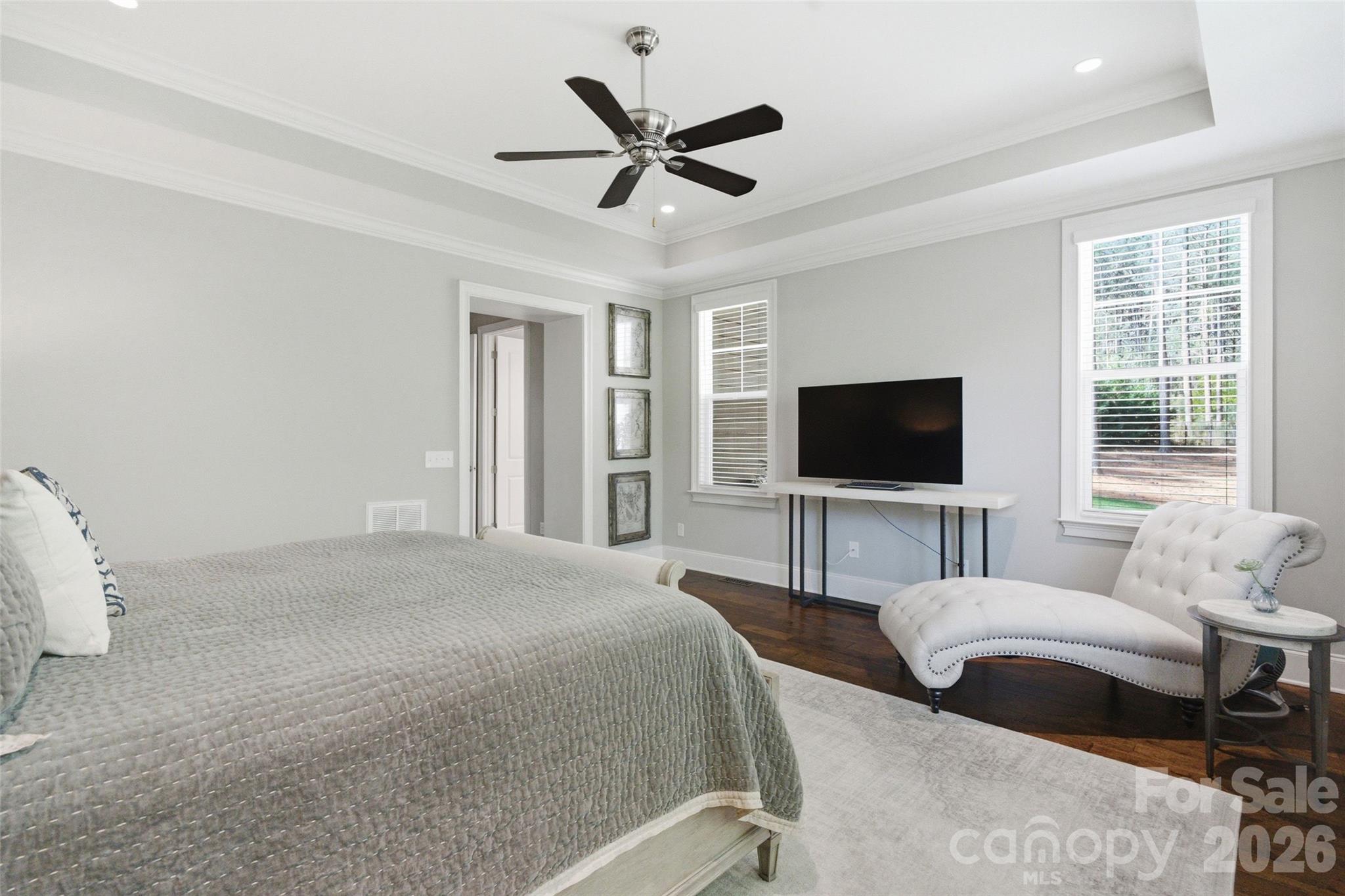 3097 Sherman Drive Lancaster, SC 29720 - Photo 23 of 48 a bedroom with a bed a window and a flat screen tv
