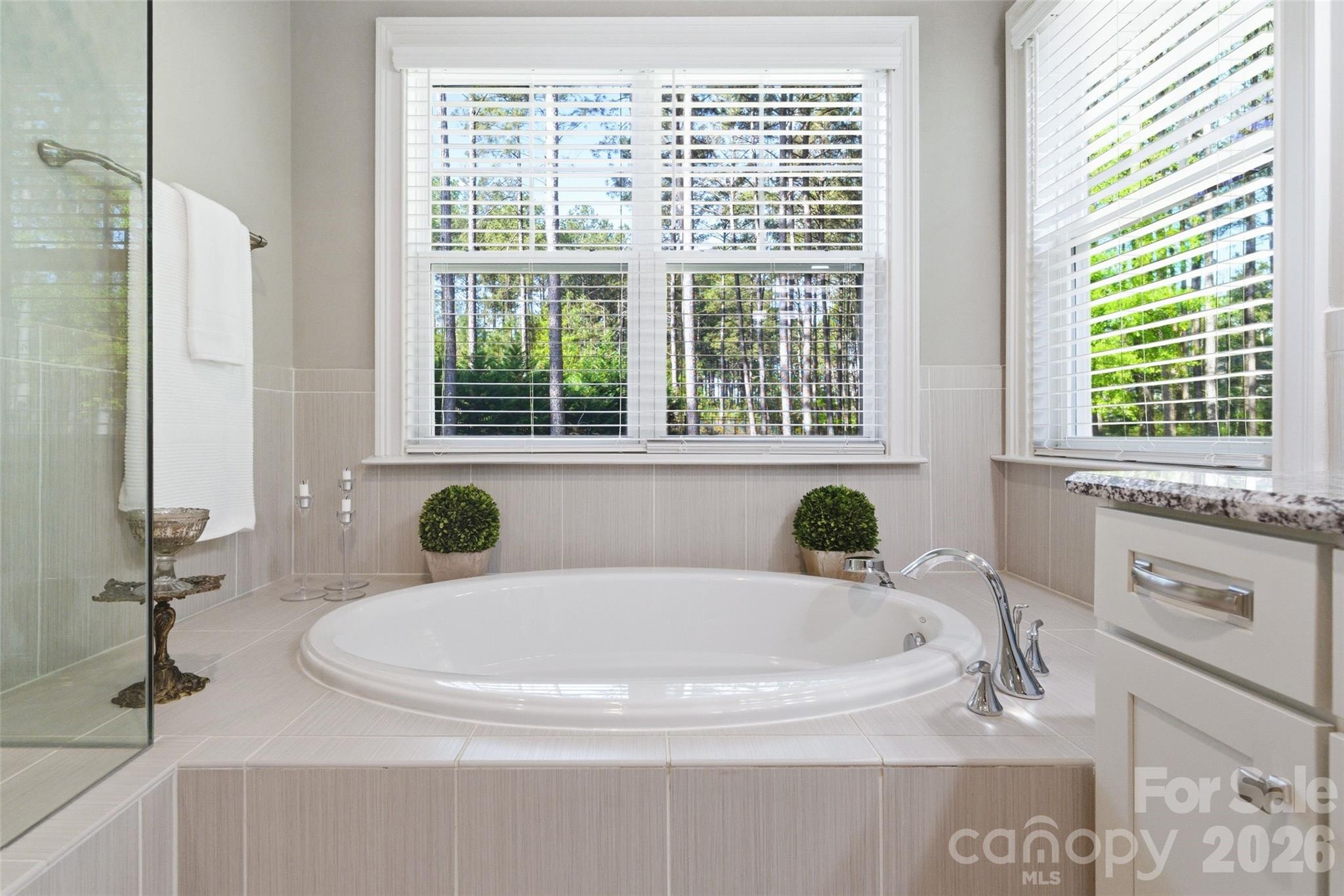 3097 Sherman Drive Lancaster, SC 29720 - Photo 26 of 48 a bathroom with a granite countertop sink and a mirror