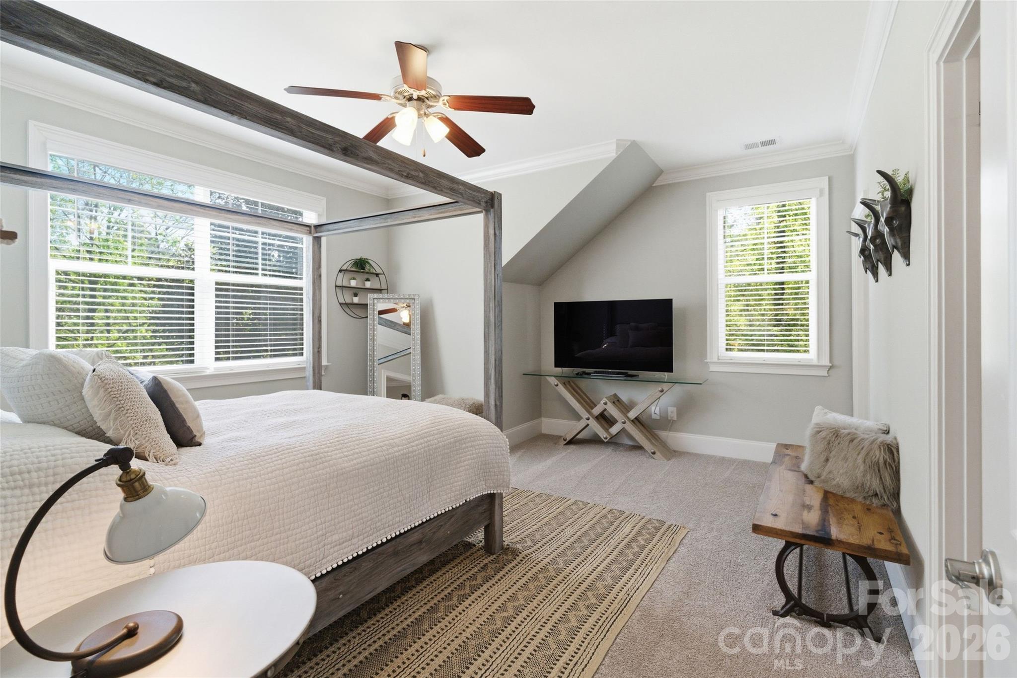 3097 Sherman Drive Lancaster, SC 29720 - Photo 29 of 48 a bedroom with a bed and a flat screen tv