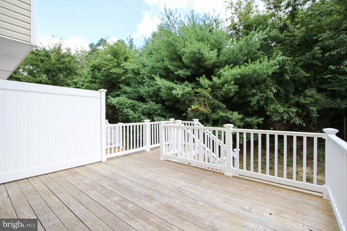 3306 Castle Ridge Circle, Unit 20 Silver Spring, MD 20904 - Photo 21 of 24 Beautiful private deck, with nice view of trees