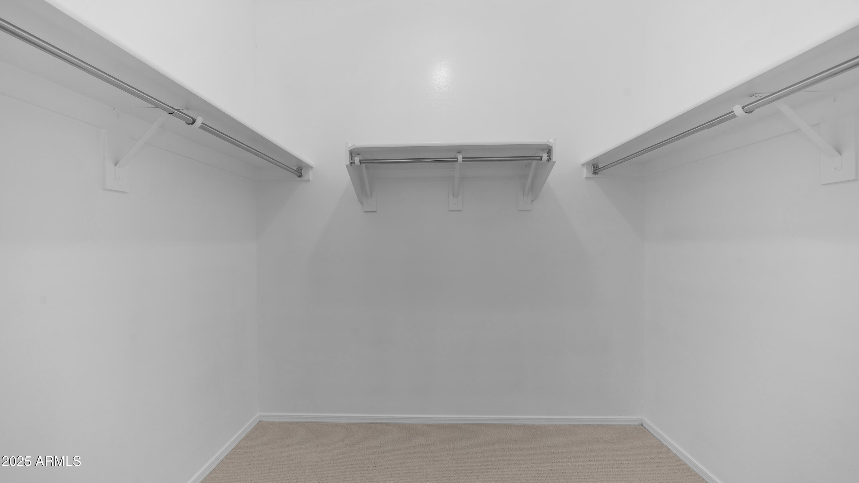 42017 West Rosa Drive Maricopa, AZ 85138 - Photo 8 of 13 a view of an empty walk in closet