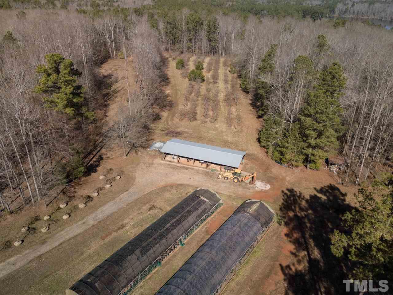 3820 Durham Road Raleigh, NC 27614 - Photo 3 of 11 a view of a yard with a house