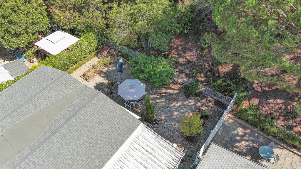 4650 Dulin Road, Unit 178 Fallbrook, CA 92003 - Photo 35 of 56 a view of a wooden fence and a bench