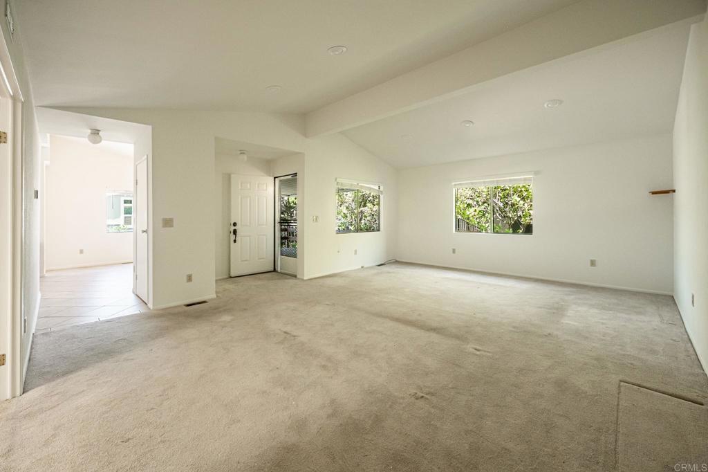 4650 Dulin Road, Unit 178 Fallbrook, CA 92003 - Photo 9 of 56 a view of an empty room with a window