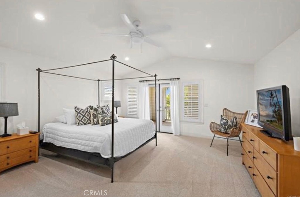 3 Tranquility Place Ladera Ranch, CA 92694 - Photo 24 of 63 a bedroom with a bed and flat tv screen on the dresser