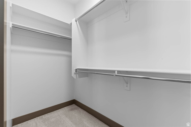 2724 Mt Jordan Road Sandy, UT 84092 - Photo 23 of 33 Walk in closet with light carpet