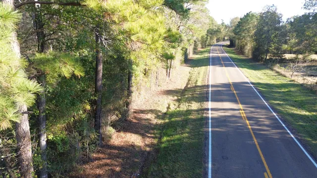 a view of an outdoor space and trees