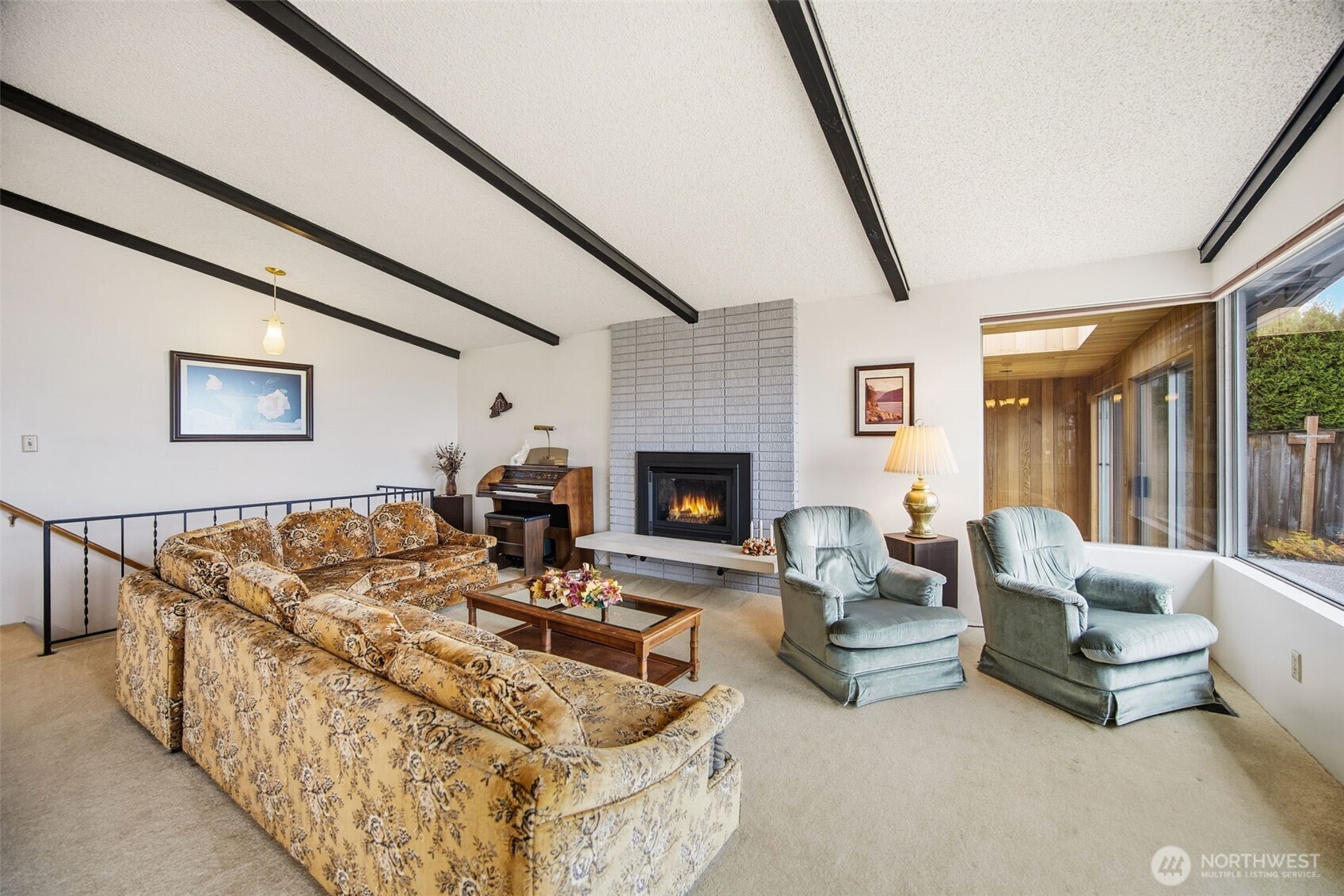 204 Southwest 298th Place Federal Way, WA 98023 - Photo 16 of 31 a living room with furniture and a fireplace