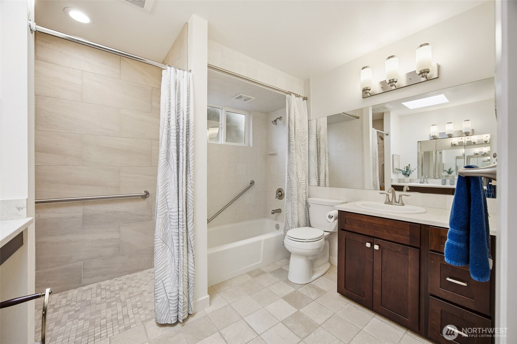 204 Southwest 298th Place Federal Way, WA 98023 - Photo 19 of 31 a bathroom with a bathtub shower sink mirror and toilet