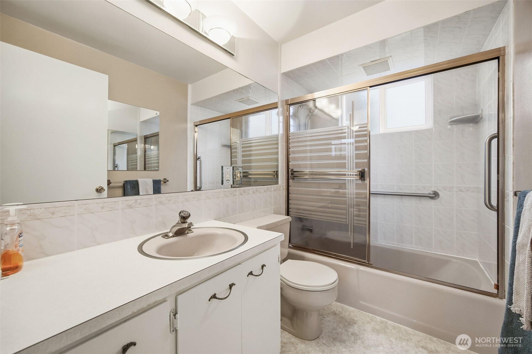 204 Southwest 298th Place Federal Way, WA 98023 - Photo 23 of 31 a bathroom with a sink a toilet and shower