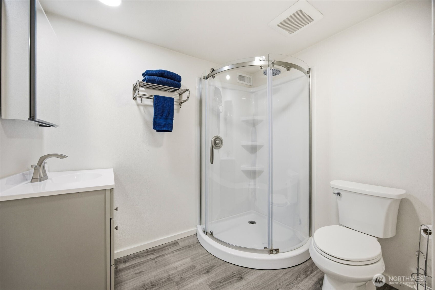 204 Southwest 298th Place Federal Way, WA 98023 - Photo 27 of 31 a bathroom with a granite countertop sink a toilet and shower