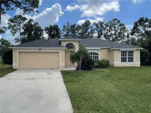 front view of a house with a yard