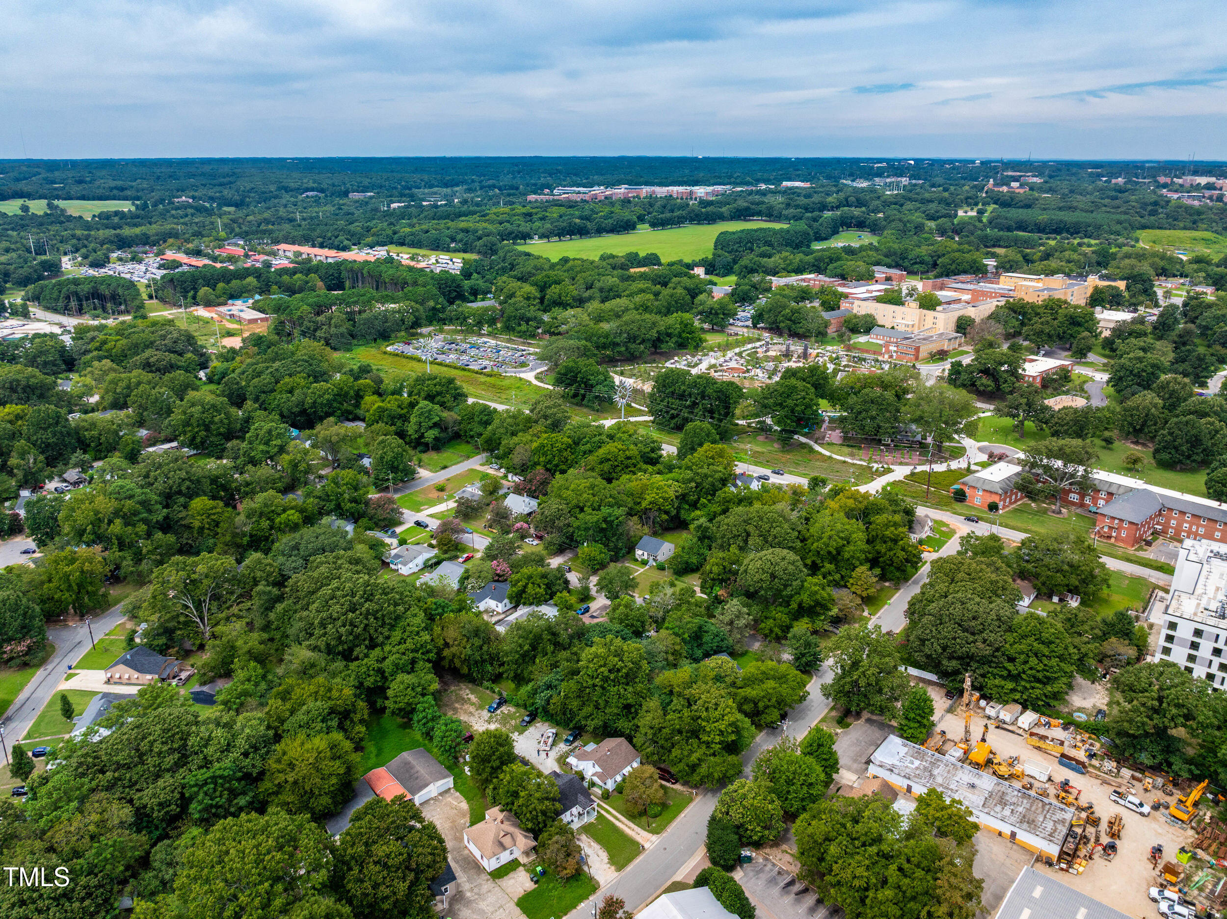 1317 Curfman Street Raleigh, NC 27603 - Photo 13 of 29 an aerial view of residential houses with outdoor space and trees