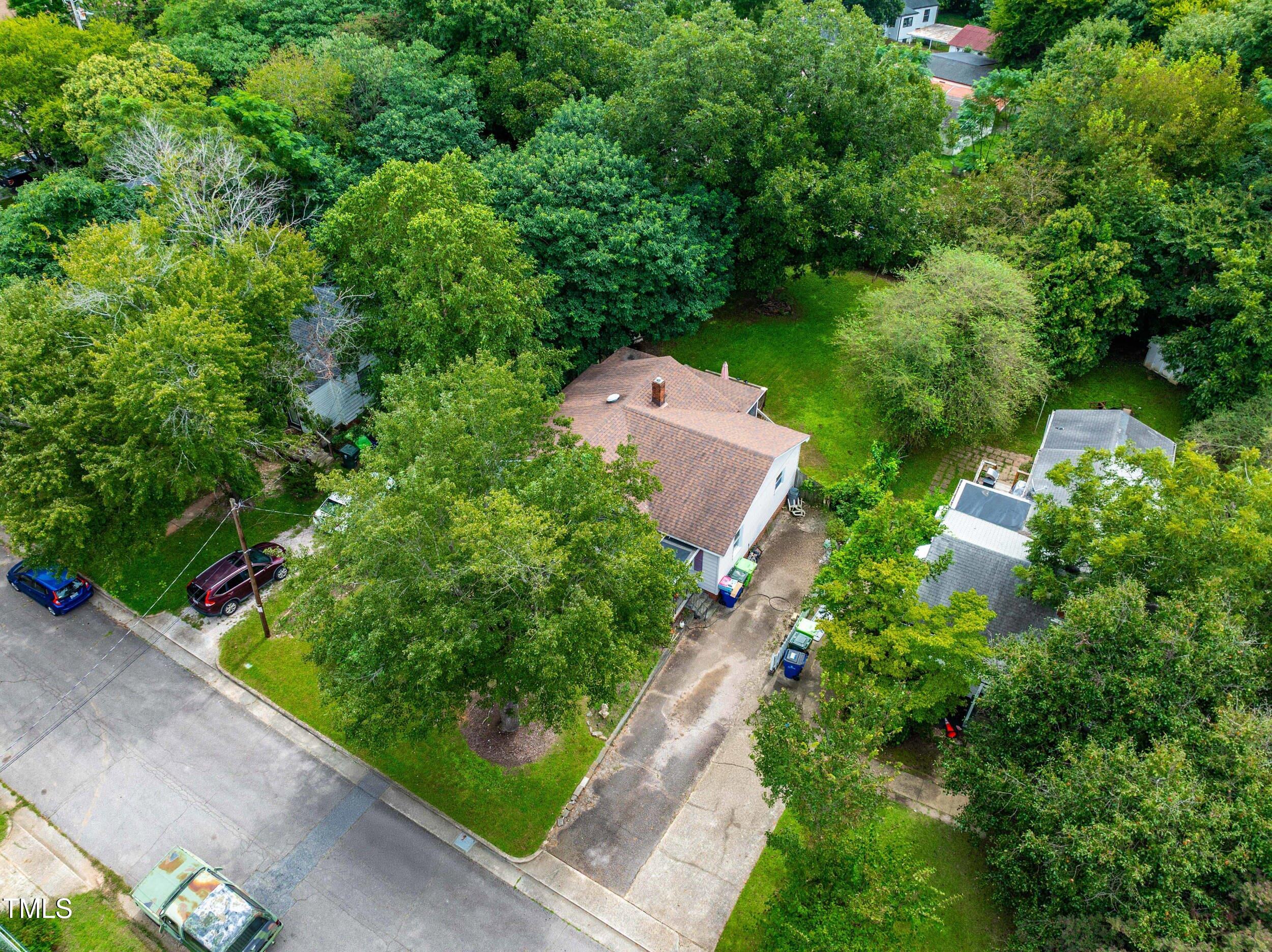 1317 Curfman Street Raleigh, NC 27603 - Photo 15 of 29 an aerial view of a house with a yard and garden