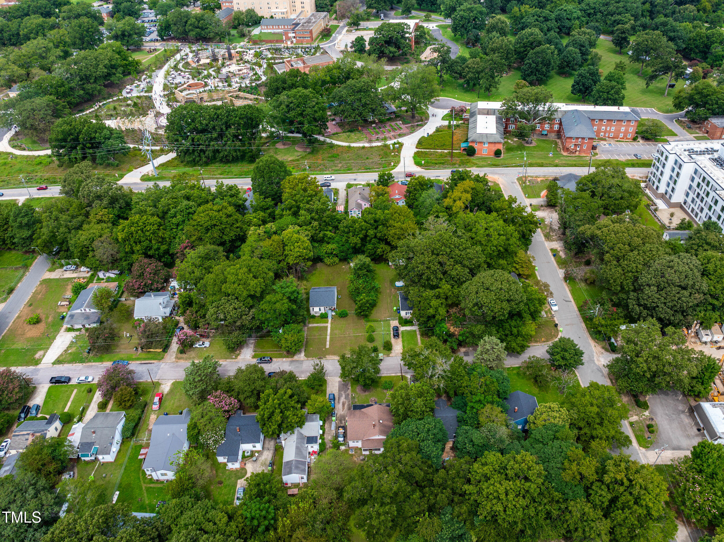 1317 Curfman Street Raleigh, NC 27603 - Photo 27 of 29 an aerial view of residential houses with outdoor space and lake view