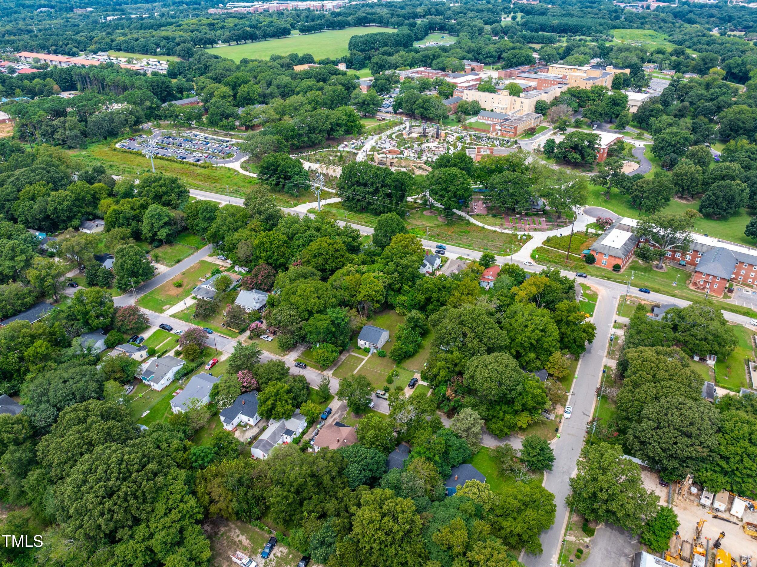 1317 Curfman Street Raleigh, NC 27603 - Photo 28 of 29 an aerial view of residential houses with outdoor space and trees