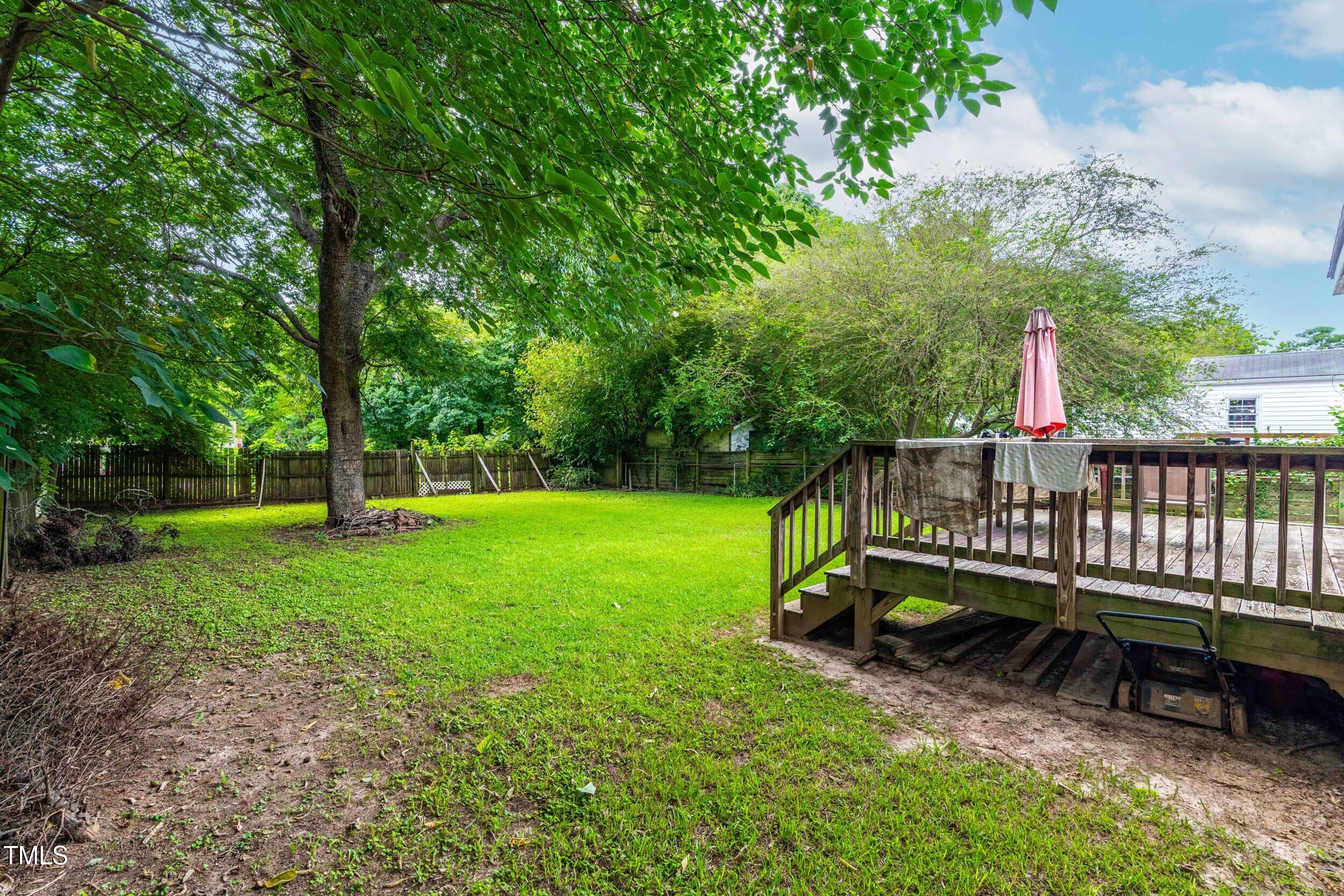1317 Curfman Street Raleigh, NC 27603 - Photo 7 of 29 a view of a deck with a yard