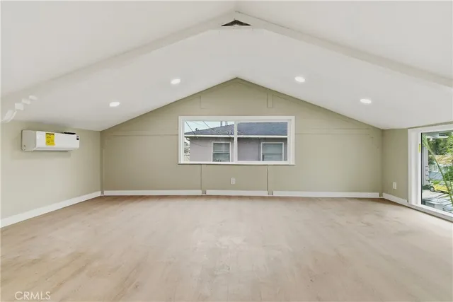 a bathroom with a shower toilet and sink