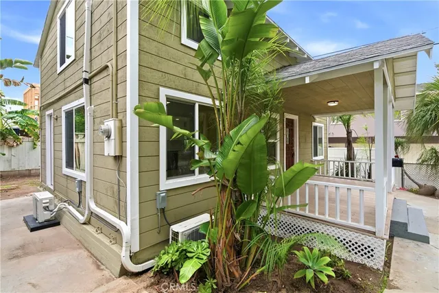 a view of a chair and table in the patio