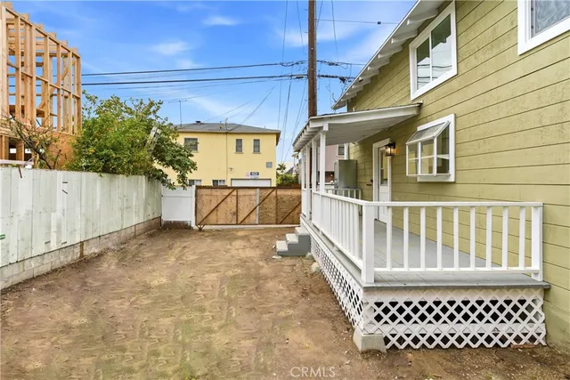 a front view of a house with a glass door