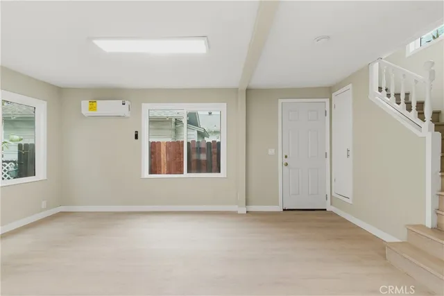 a view of a kitchen with a sink cabinets and a window