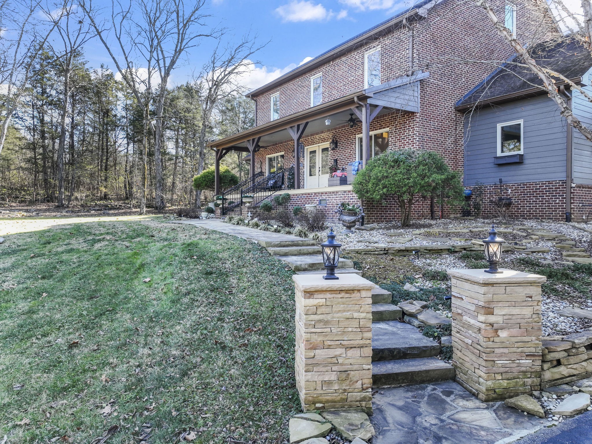 a front view of a house with a yard