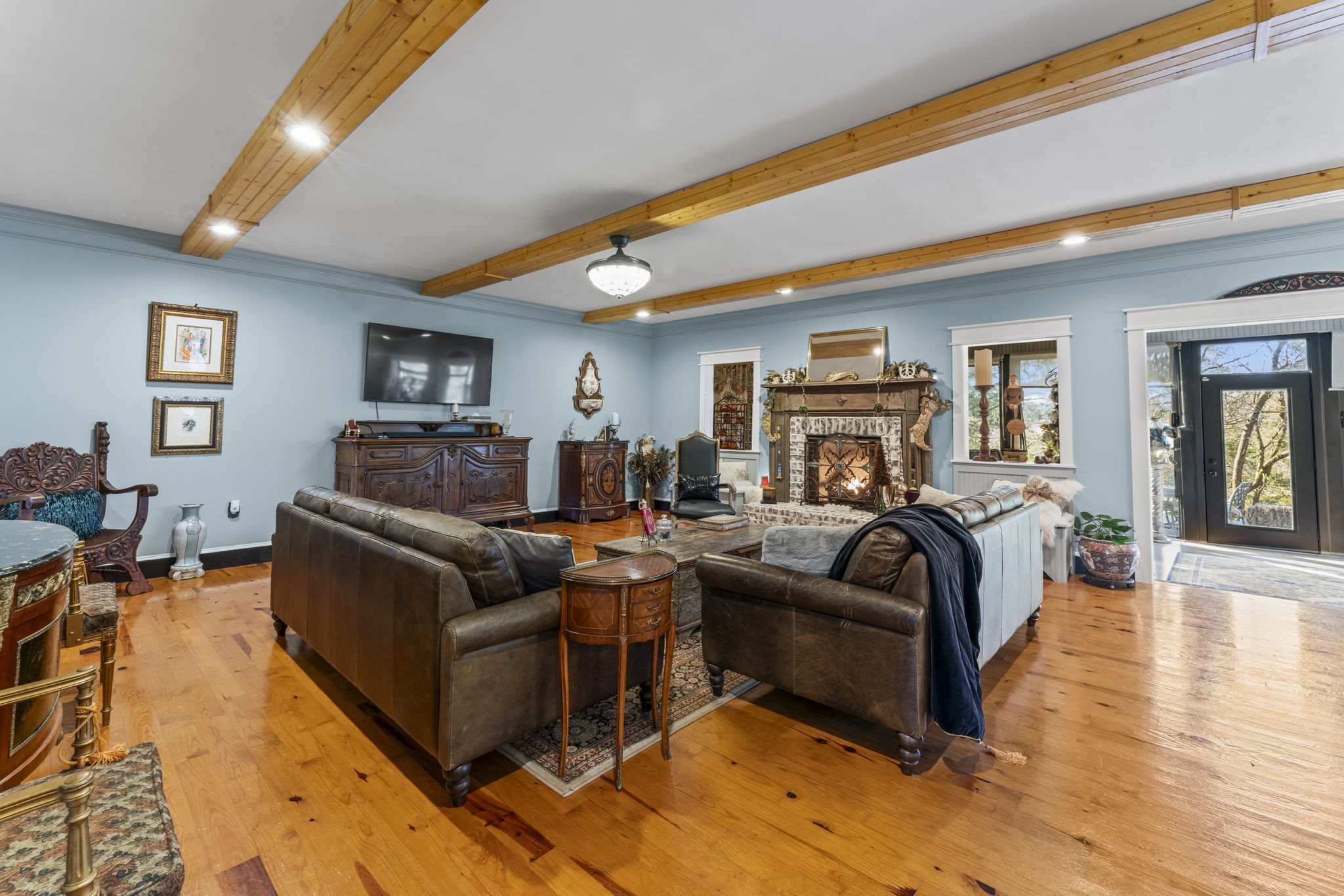 4701 Browns Mill Road Lascassas, TN 37085 - Photo 11 of 89 a living room with furniture and a flat screen tv