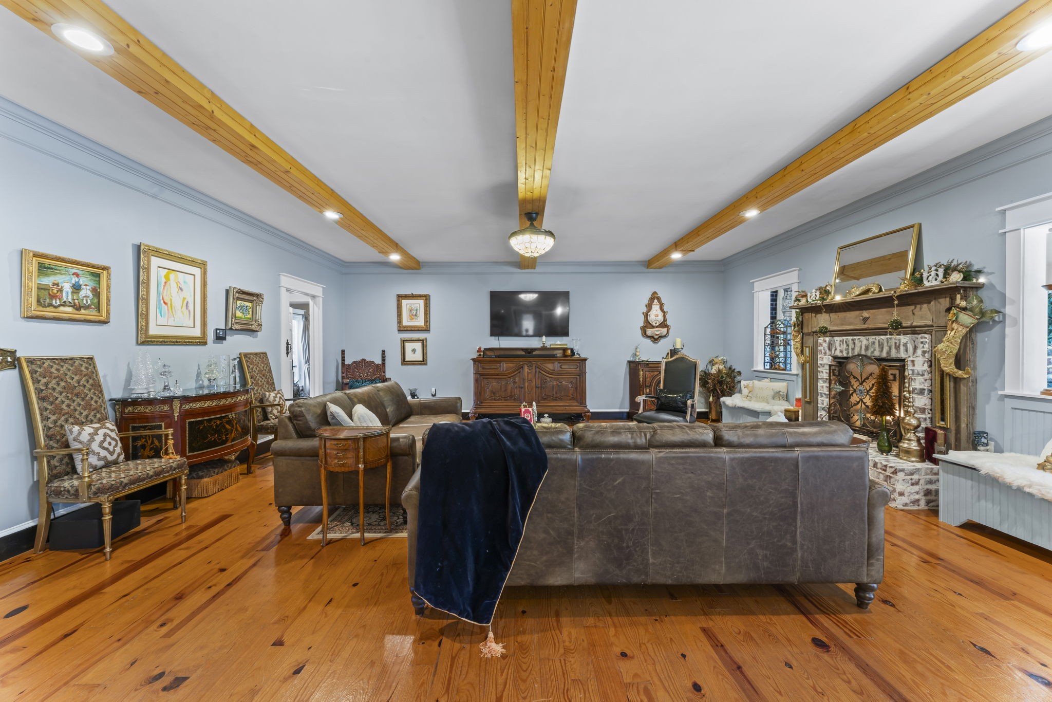 4701 Browns Mill Road Lascassas, TN 37085 - Photo 12 of 89 a living room with fireplace furniture and a wooden floor
