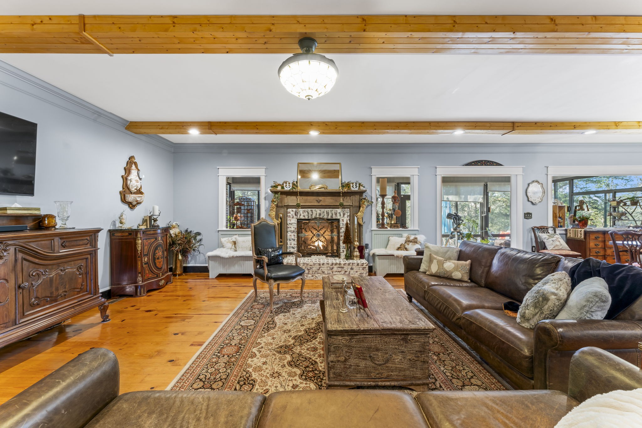 4701 Browns Mill Road Lascassas, TN 37085 - Photo 15 of 89 a living room with furniture and a fireplace