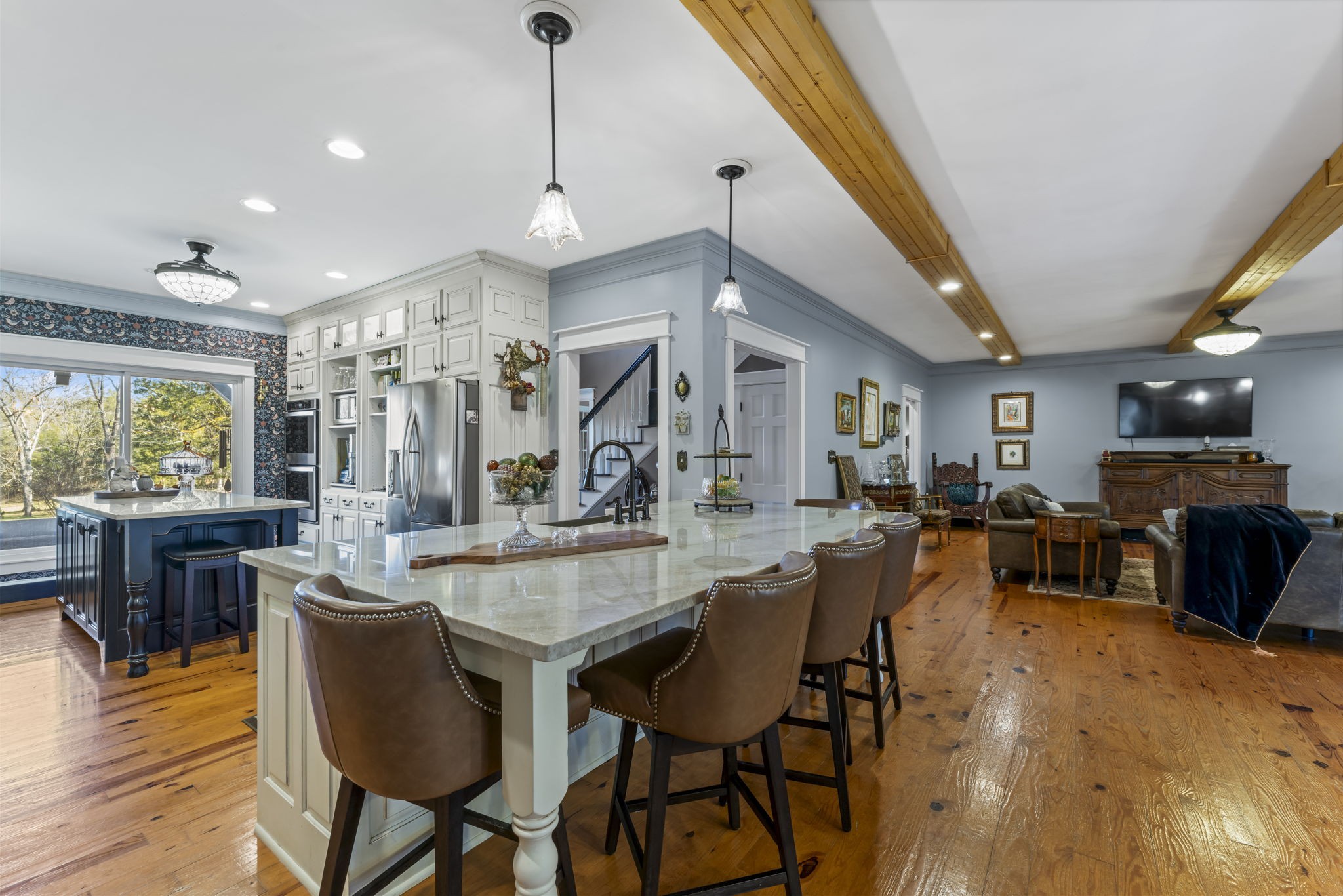 4701 Browns Mill Road Lascassas, TN 37085 - Photo 17 of 89 a large kitchen with a table and chairs