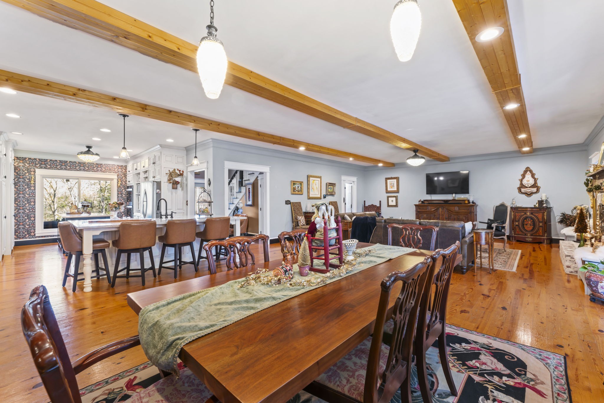4701 Browns Mill Road Lascassas, TN 37085 - Photo 27 of 89 a dining hall view with a large dining table and chairs with the view of kitchen