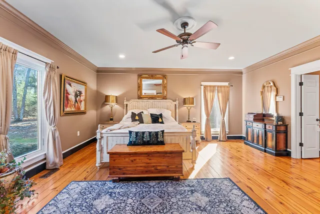 a kitchen with granite countertop lots of clutter and stainless steel appliances