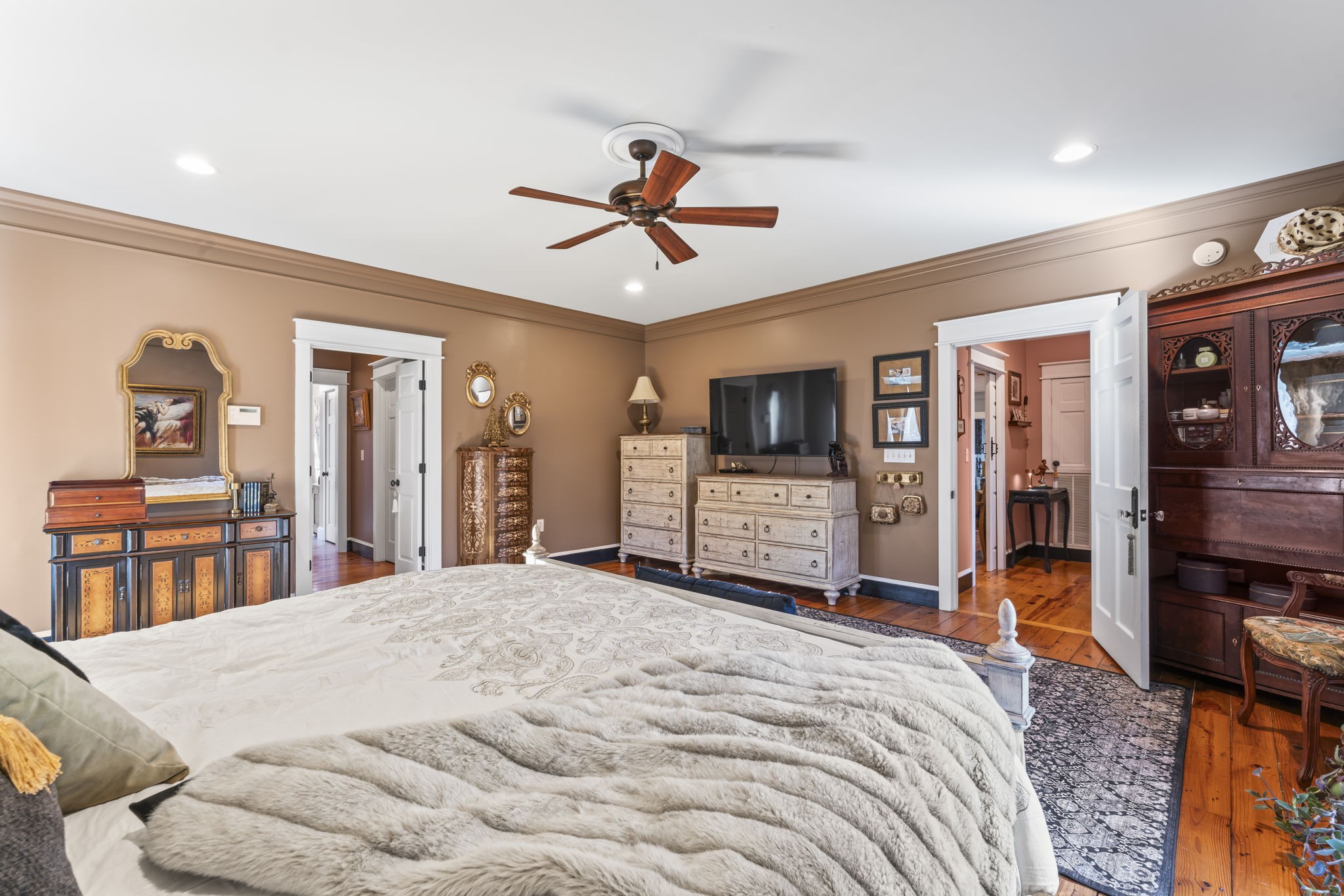 4701 Browns Mill Road Lascassas, TN 37085 - Photo 35 of 89 a bedroom with a large bed and a tv