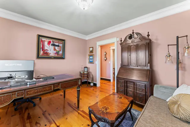 a bed room with a bed and a window