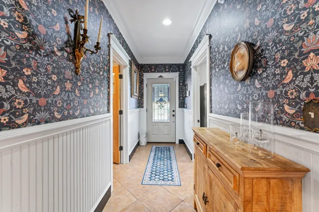 a bathroom with a sink double vanity and a mirror