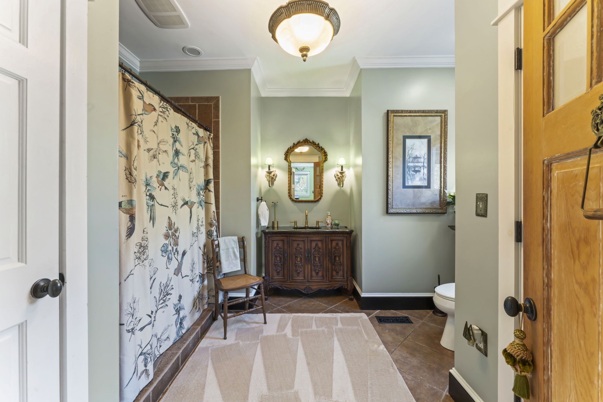 4701 Browns Mill Road Lascassas, TN 37085 - Photo 43 of 89 a bathroom with a sink a mirror and a shower