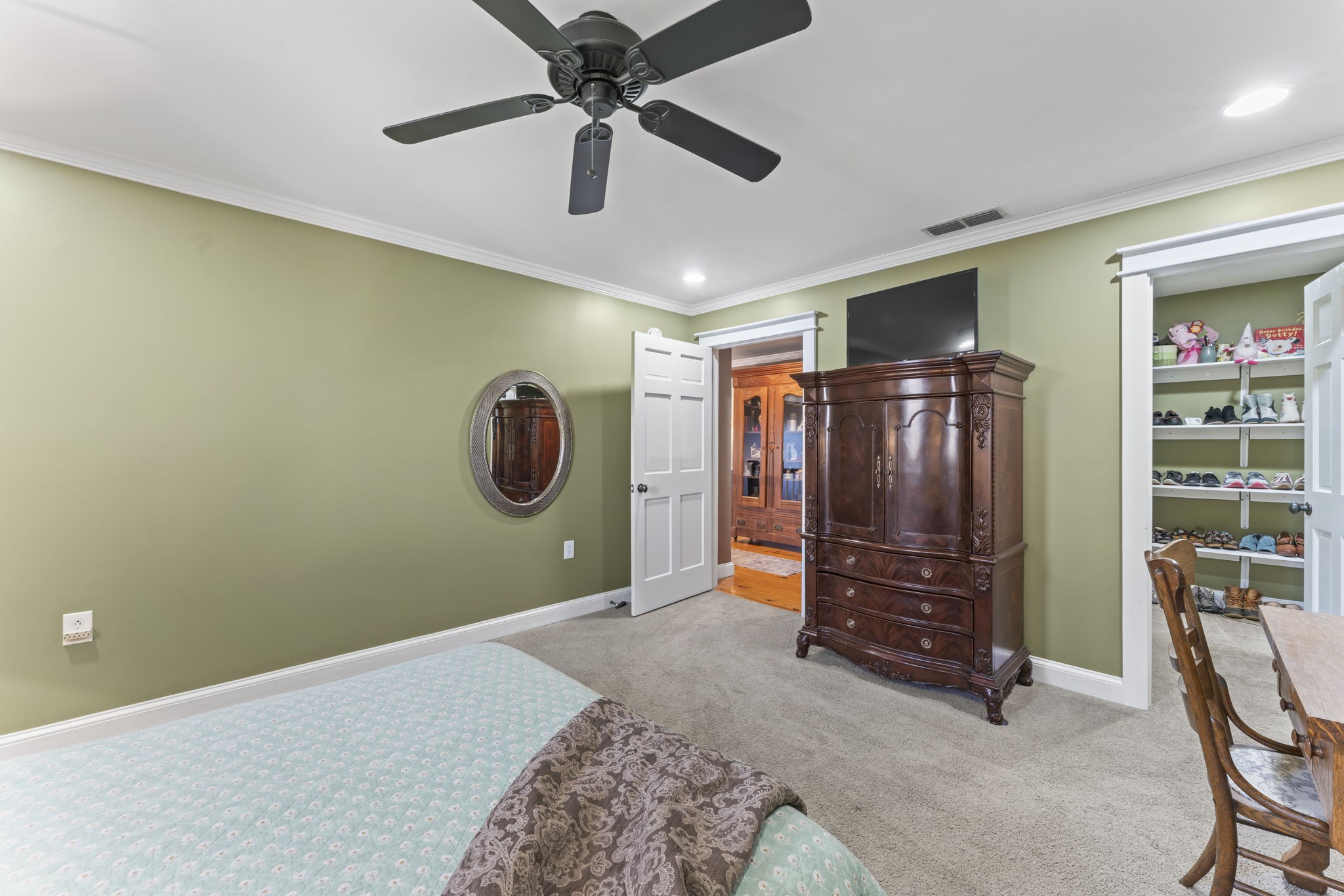 4701 Browns Mill Road Lascassas, TN 37085 - Photo 55 of 89 a bedroom with a bed and a fan