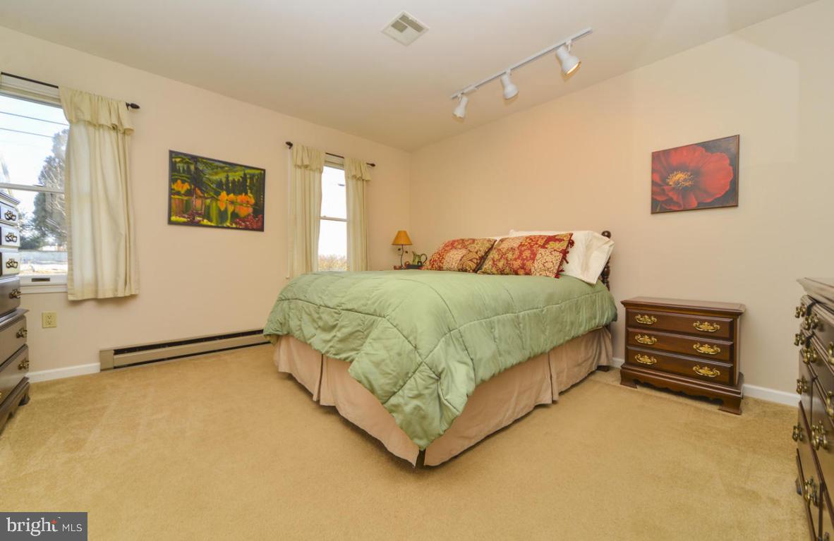 320 East Lexington Road Lititz, PA 17543 - Photo 14 of 33 a bedroom with a bed dresser and a window