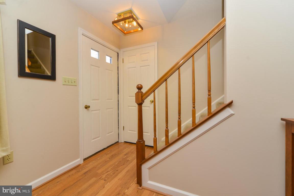 320 East Lexington Road Lititz, PA 17543 - Photo 4 of 33 a view of a hallway with wooden floor and staircase