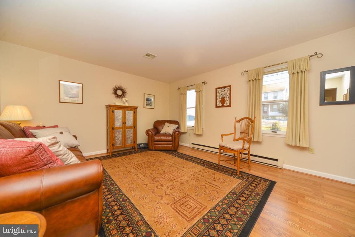 320 East Lexington Road Lititz, PA 17543 - Photo 5 of 33 a bed room with a bed and a chair