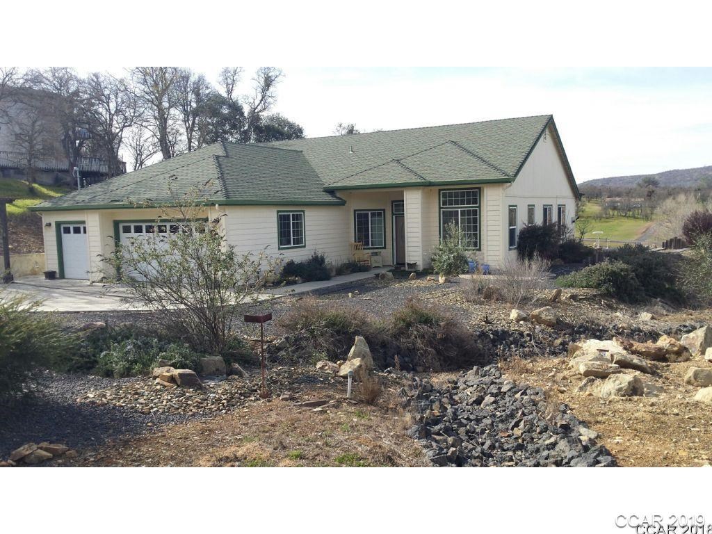 2306 Quail Hill Road Copperopolis, CA 95228 - Photo 1 of 1 a house view with a outdoor space