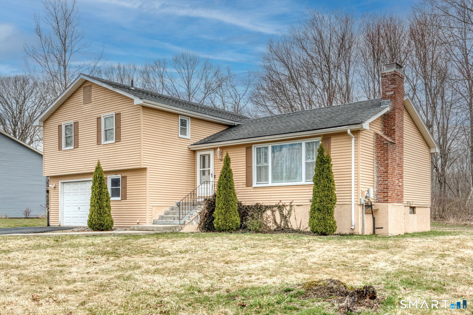 160 Windbrook Drive Windsor, CT 06095 - Photo 1 of 35 a front view of a house with a yard