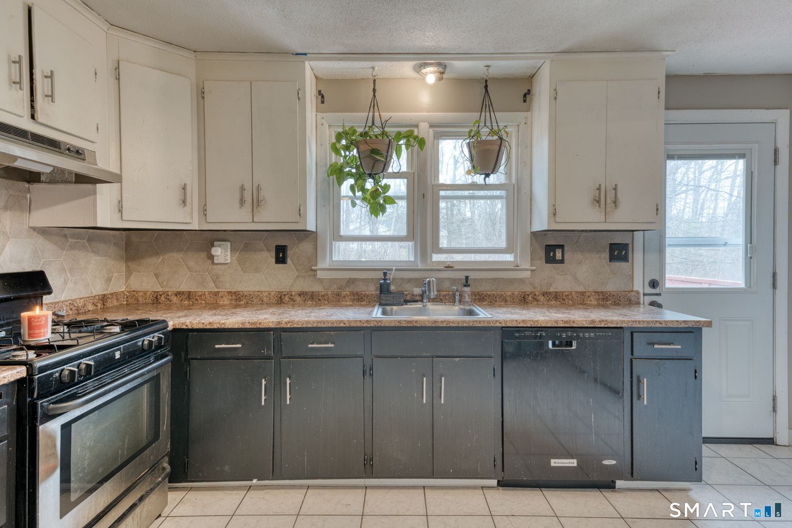 160 Windbrook Drive Windsor, CT 06095 - Photo 11 of 35 a kitchen with a sink stove and cabinets