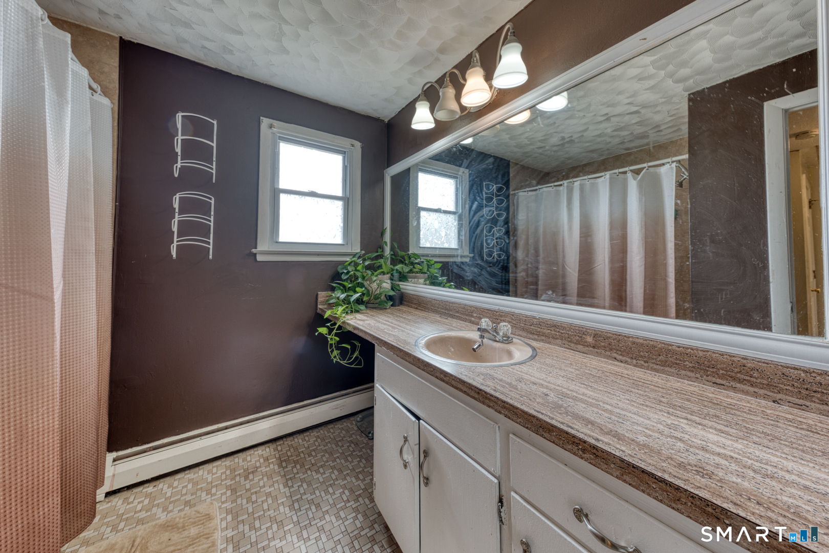 160 Windbrook Drive Windsor, CT 06095 - Photo 15 of 35 a bathroom with a granite countertop sink and a mirror