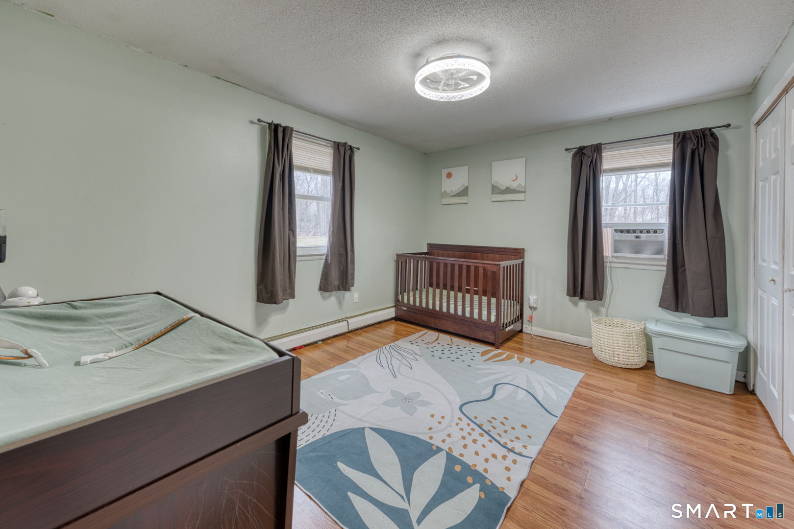 160 Windbrook Drive Windsor, CT 06095 - Photo 16 of 35 a bedroom with a bed and a window