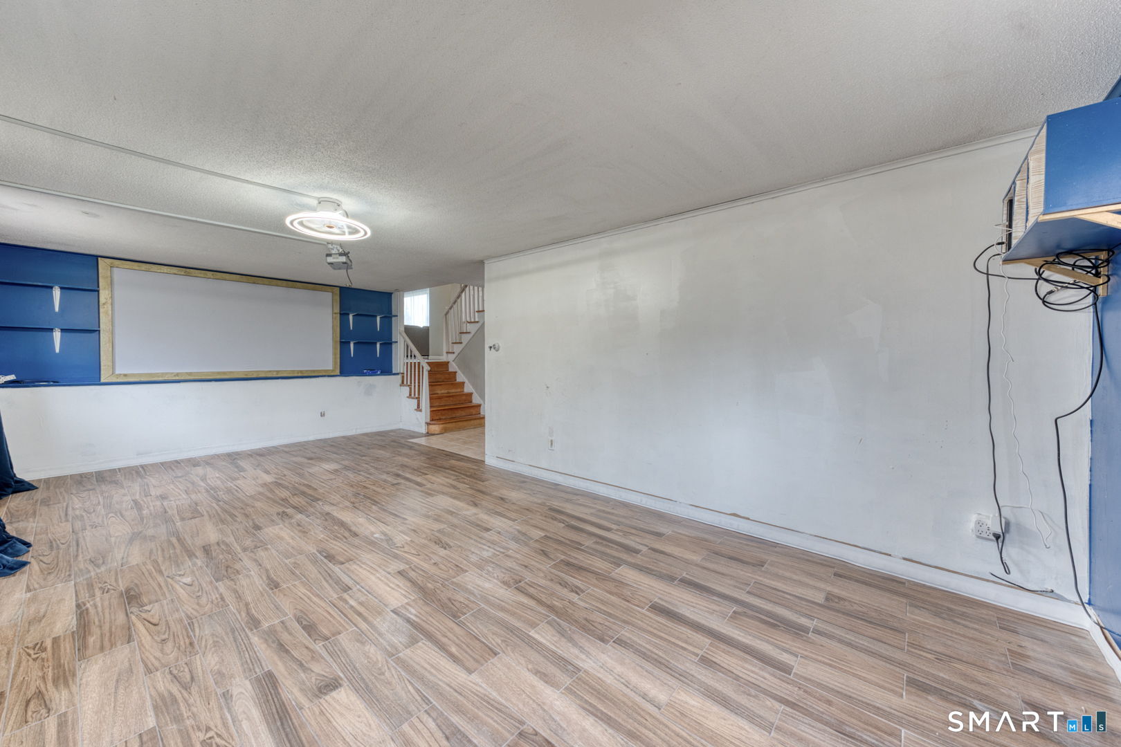 160 Windbrook Drive Windsor, CT 06095 - Photo 23 of 35 a view of empty room with wooden floor